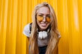 Close-up portrait of adorable blonde woman in cute sunglasses. Outdoor photo of spectacular fair-hai