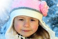 Close-up portrait of adorable smiling child girl wearing pink kn Royalty Free Stock Photo