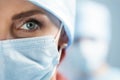 Close up portrait of adult female surgeon doctor wearing protect Royalty Free Stock Photo