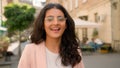 Close up portrait amazed excited happy Indian Arabian ethnic woman lady female businesswoman smiling laughing applauding