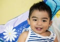 Close up portrait of Asian boy, Smiling action. Royalty Free Stock Photo