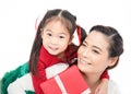 Close up portrait of Asian little toddler girl surprise her mother with gift box
