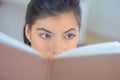 Close up portrait asian woman reading book Royalty Free Stock Photo