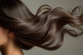 Close-up portrait of attractive Caucasian young woman with perfect makeup and long wavy brown hair. Charming model with Royalty Free Stock Photo