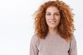 Close-up portrait attractive, feminine lovely redhead woman with curly natural hair, wear beige blouse, smiling toothy