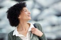 Close up attractive middle age woman laughing and looking away Royalty Free Stock Photo