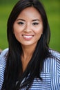 Close up portrait of an attractive smiling asian woman Royalty Free Stock Photo