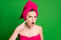 Close-up portrait of attractive worried mad lady wearing towel turban touching cheek pimple isolated on bright green Royalty Free Stock Photo