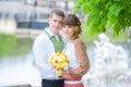 Close up portrait of attractive young couple piggybacking outdoors. Royalty Free Stock Photo