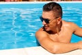 Close up portrait of attractive young man in sunglasses resting Royalty Free Stock Photo