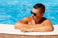 Close up portrait of attractive young man in sunglasses resting Royalty Free Stock Photo