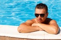 Close up portrait of attractive young man in sunglasses resting Royalty Free Stock Photo