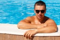 Close up portrait of attractive young man in sunglasses resting Royalty Free Stock Photo