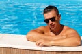 Close up portrait of attractive young man in sunglasses resting Royalty Free Stock Photo