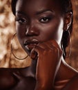 Close up portrait of beautiful african woman with creative gold make up Royalty Free Stock Photo