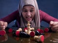 Muslim Woman Gets Angry When Playing Chess Royalty Free Stock Photo