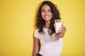 Beautiful asian woman offering a glass of fresh milk Royalty Free Stock Photo