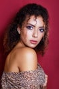 Close-up portrait of a beautiful young african american female fashion model with curly hair Royalty Free Stock Photo