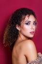 Close-up portrait of a beautiful young african american female fashion model with curly hair Royalty Free Stock Photo