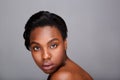 Close up portrait of beautiful black woman with bare shoulders Royalty Free Stock Photo