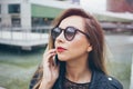 Close-up portrait of a beautiful Caucasian woman with red lipstick. Royalty Free Stock Photo