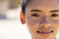 Close-up portrait of beautiful caucasian young woman smiling and looking at camera, copy space Royalty Free Stock Photo