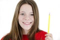 Close-up portrait of a beautiful excited teenage girl hold pencil. Adorable happy teenage girl smiling. Idea pencil girl.