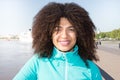 Beautiful female tourist girl fashion model with curly hair Royalty Free Stock Photo