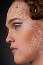 Close up portrait of beautiful girl with face art Royalty Free Stock Photo