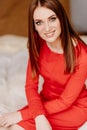 Close-up portrait beautiful girl long hair in red Royalty Free Stock Photo