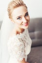 Portrait of Beautiful Happy Curly Blond Hair Bride. Fashion Dress and MakeUp with Red Lips Royalty Free Stock Photo