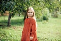 Close up portrait of beautiful little girl with blonde long hair and big blue eyes Royalty Free Stock Photo