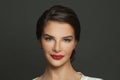 Close up portrait of beautiful pretty cheerful brunette woman on black background Royalty Free Stock Photo