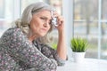 Close up portrait of beautiful sad senior woman at home Royalty Free Stock Photo