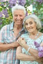 Close-up portrait of beautiful senior couple hugging Royalty Free Stock Photo