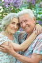 Close-up portrait of beautiful senior couple hugging Royalty Free Stock Photo