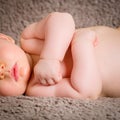 Close-up portrait of a beautiful sleeping baby on blanchet Royalty Free Stock Photo