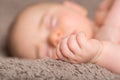 Close-up portrait of a beautiful sleeping baby on blanchet Royalty Free Stock Photo