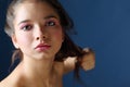 Close up portrait of beautiful sunburnt woman with pink makeup