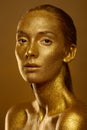 Close up portrait beautiful woman golden skin sparkles glitter Royalty Free Stock Photo