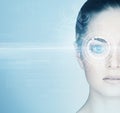 Close-up portrait of a beautiful woman with a hologram on her eye Royalty Free Stock Photo