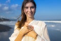 Close up portrait of beautiful woman with jewelry. Happy Caucasian woman at the beach. Beauty and fashion concept. Travel Royalty Free Stock Photo