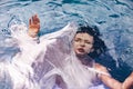 Close up portrait of beautiful woman under water with fabric. Fa Royalty Free Stock Photo