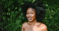 Close up portrait Beautiful young African American Black woman perfect white teeth smiling outside, sunny summer day Royalty Free Stock Photo