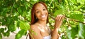 Close up portrait Beautiful young African American woman with red braids hair, perfect white teeth smiling outside Royalty Free Stock Photo