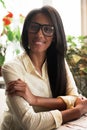 Close up portrait of a beautiful young african american woman smiling. Royalty Free Stock Photo