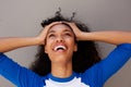 Close up beautiful young african american woman smiling and looking up Royalty Free Stock Photo