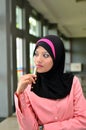 Close-up portrait of beautiful young Asian businesswomen holding pen