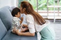 Close up portrait of beautiful young asian mother kissing her newborn baby to love asia woman lifestyle mother`s day concept with Royalty Free Stock Photo