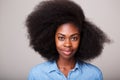 Close up portrait of beautiful young black woman with afro hair staring Royalty Free Stock Photo